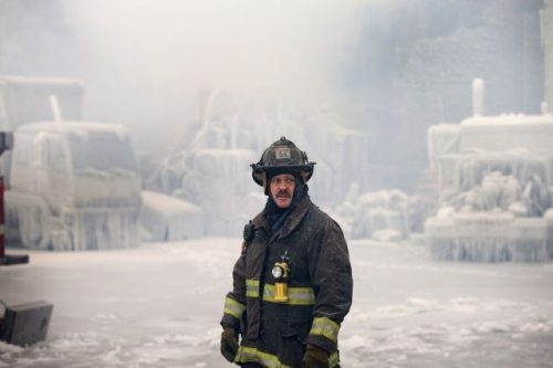 Chicago Firemen put out fire in the icy cold
