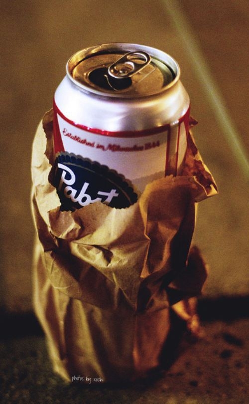 crappy beer out of a paper bag. dude, now this is cool?