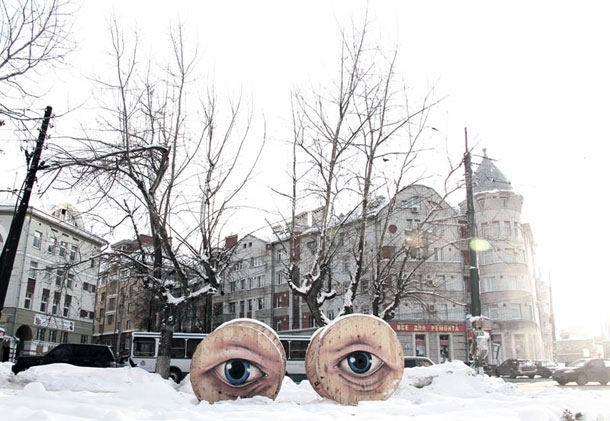 Russian Graffiti Artist Turns Buildings Into Giant Characters