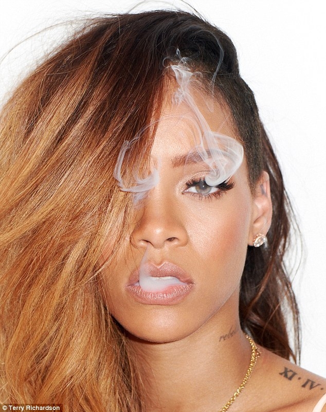 Rihanna: Photoshoot with hand rolled cigarette