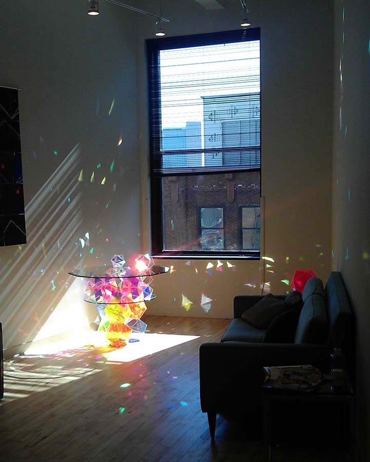 Glass Prism Table Reflects Dazzling Rainbows 