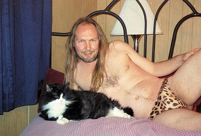 WTF Pictures Of People Posing With Animals 