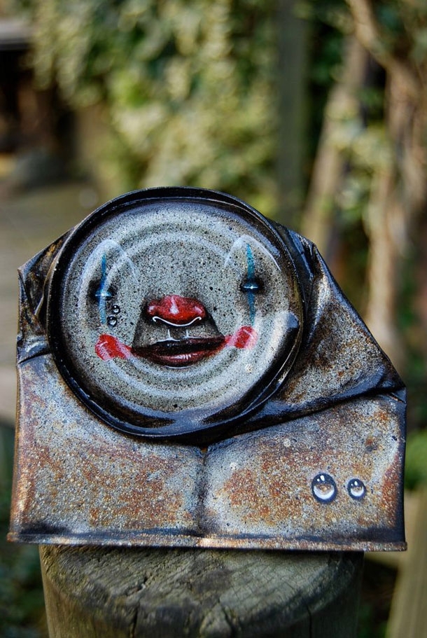 Remarkable Faces Drawn Onto Discarded Cans