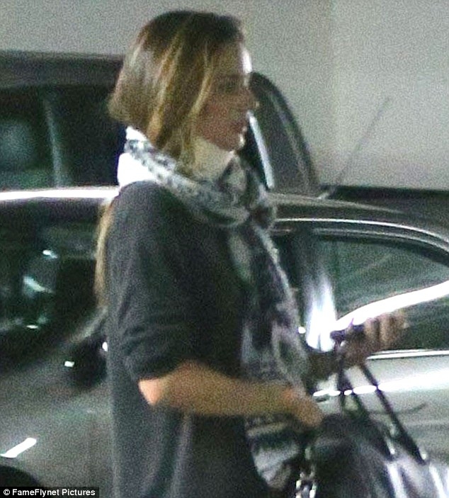 Miranda Kerr Pictured Wearing a Neck Brace