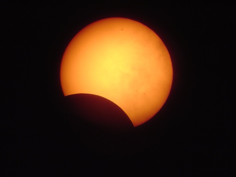 Solar Eclipses Viewed From Space.