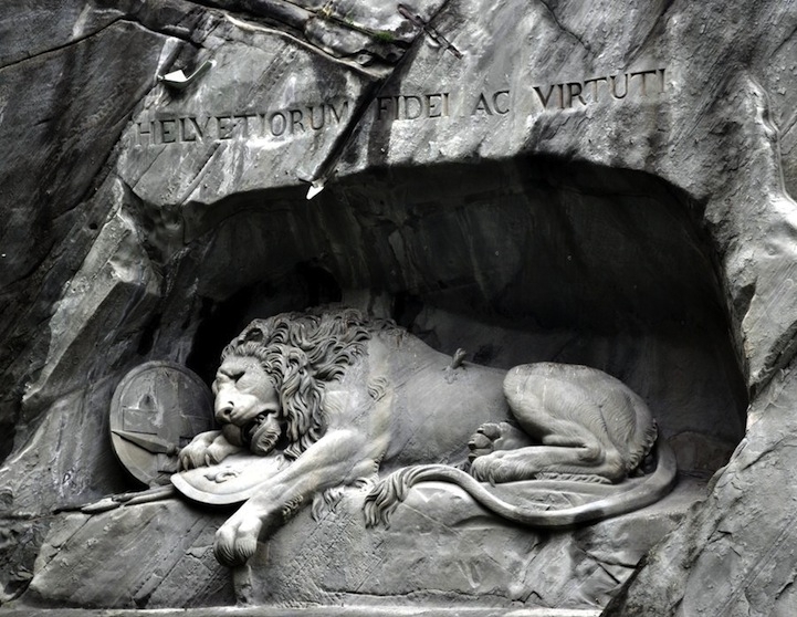 Powerful Lion Sculpture Embedded into a Cliff 