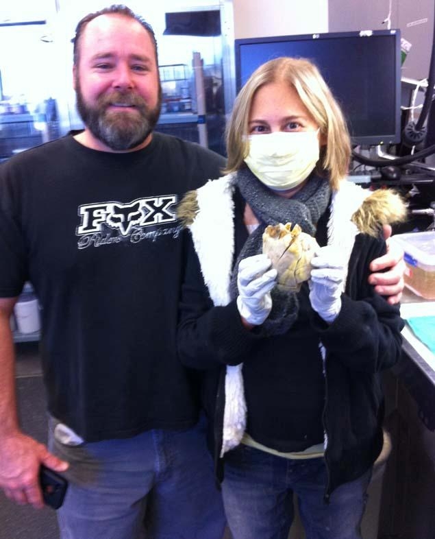 Penny Smith and her husband with Penny's old heart.