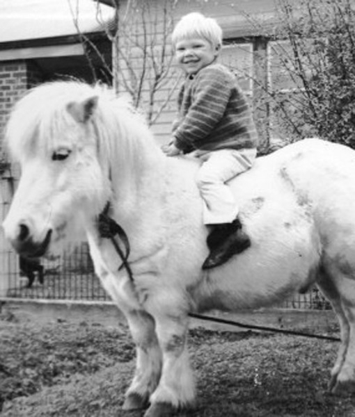 Happy boy on horse 