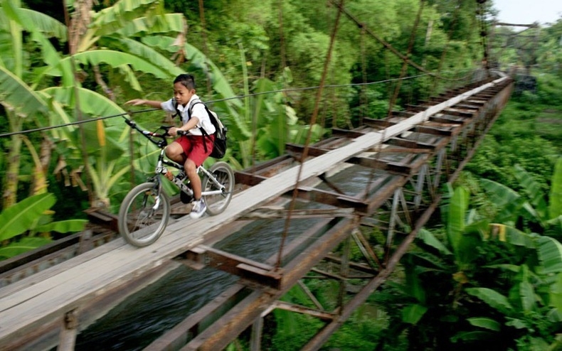 Riding across Tall Bridge 