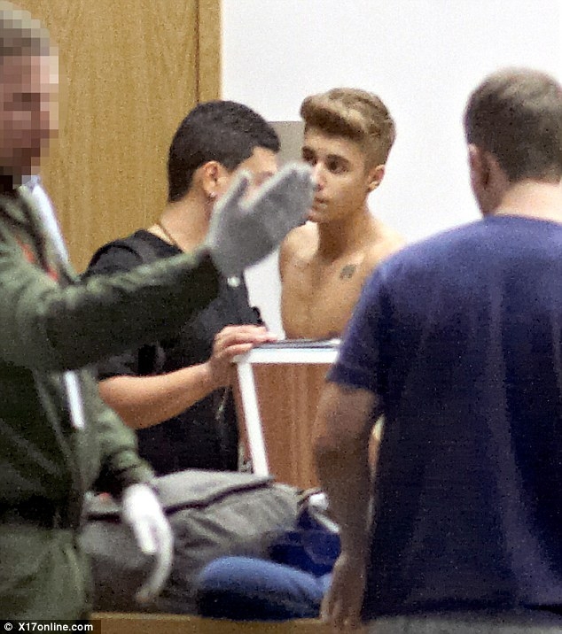 Justin Bieber Shirtless at Security 
