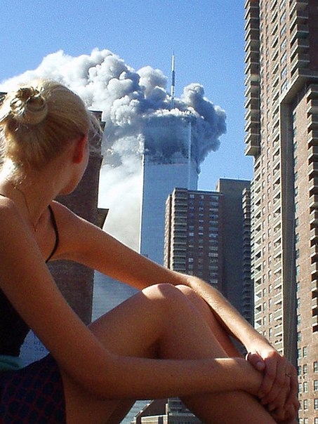 Australian Model Distracted, Picture Taken Moments After First Plane on 9/11