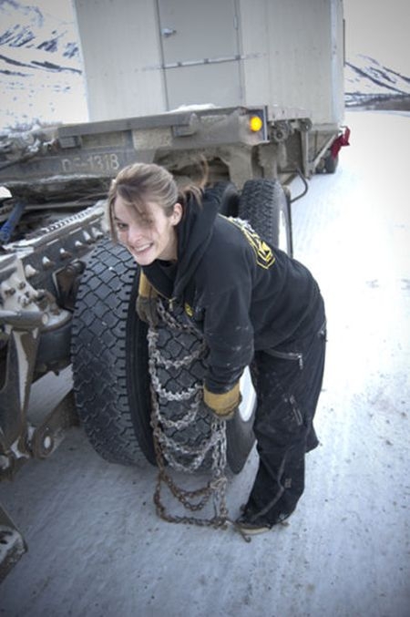 Lisa Kelly Putting On Snow Chains 