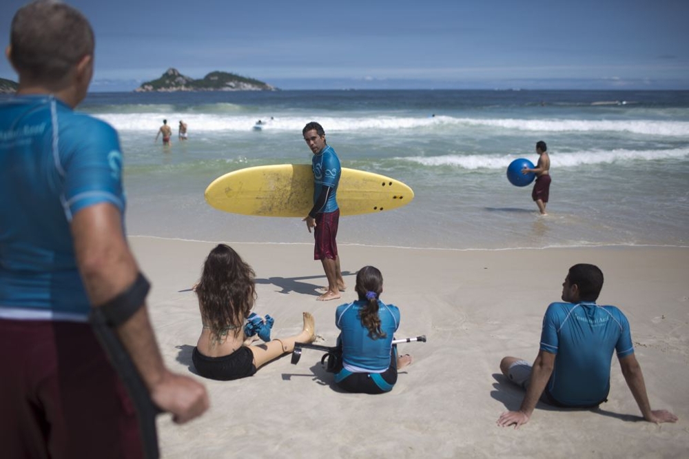 Disabled Surfers  get a lesson 