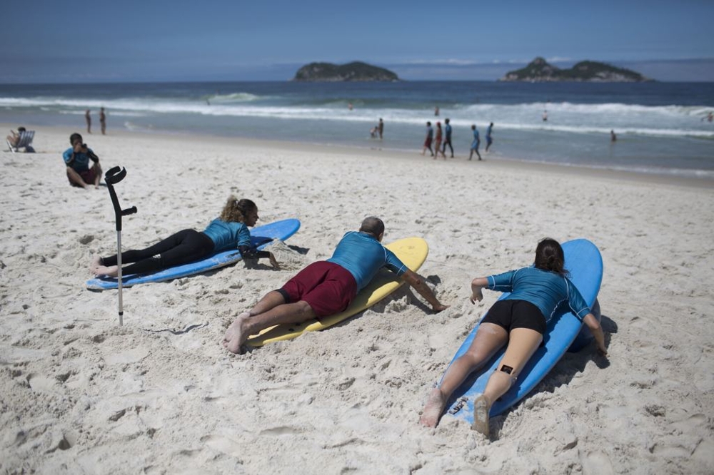 Disabled Surfers Practice before hitting the waves 