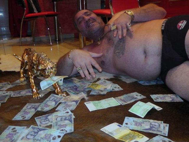 Laying In A Pile Of Cash 