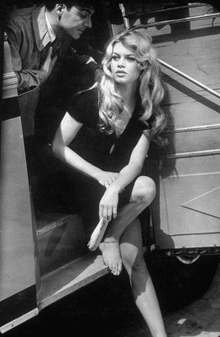  Brigitte Bardot exiting a car 