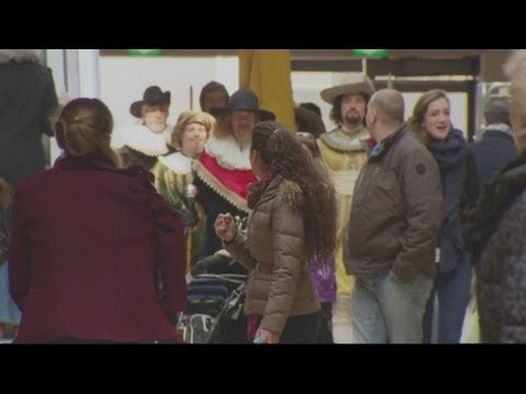Dutch flashmob arrive at shopping mall on horses 