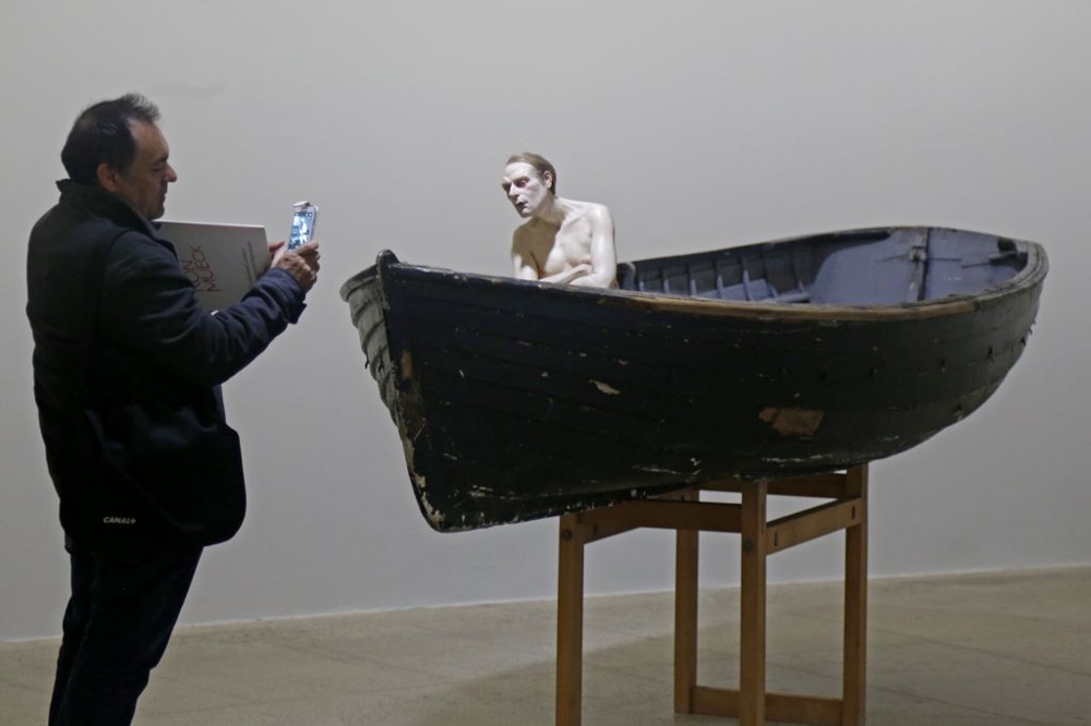 a sculpture entitled "Man in a Boat"