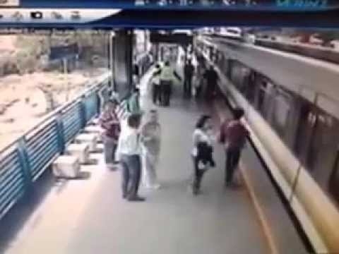 Watch a Heroic Police Officer Save a Man from an Oncoming Train 