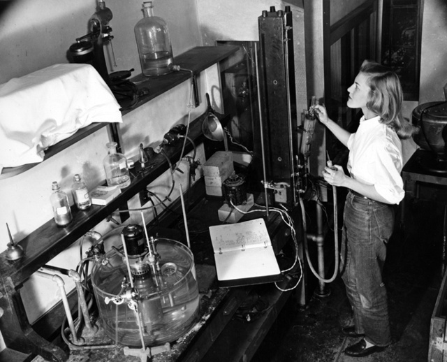 Unidentified student in a science laboratory, mid-1940s