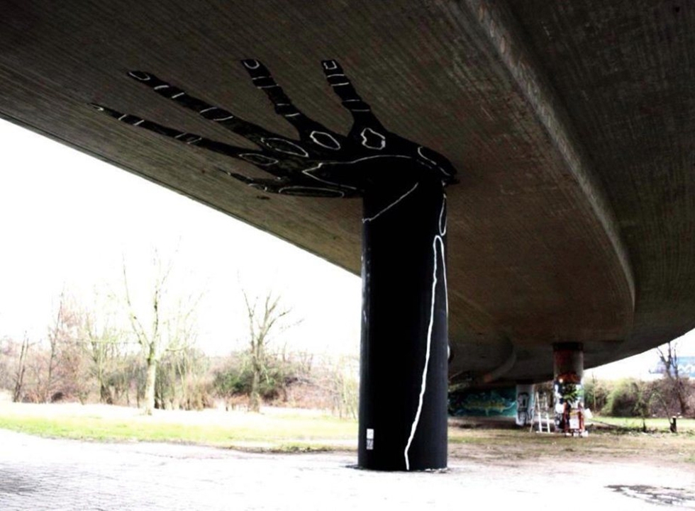 Hand Holding Overpasses 