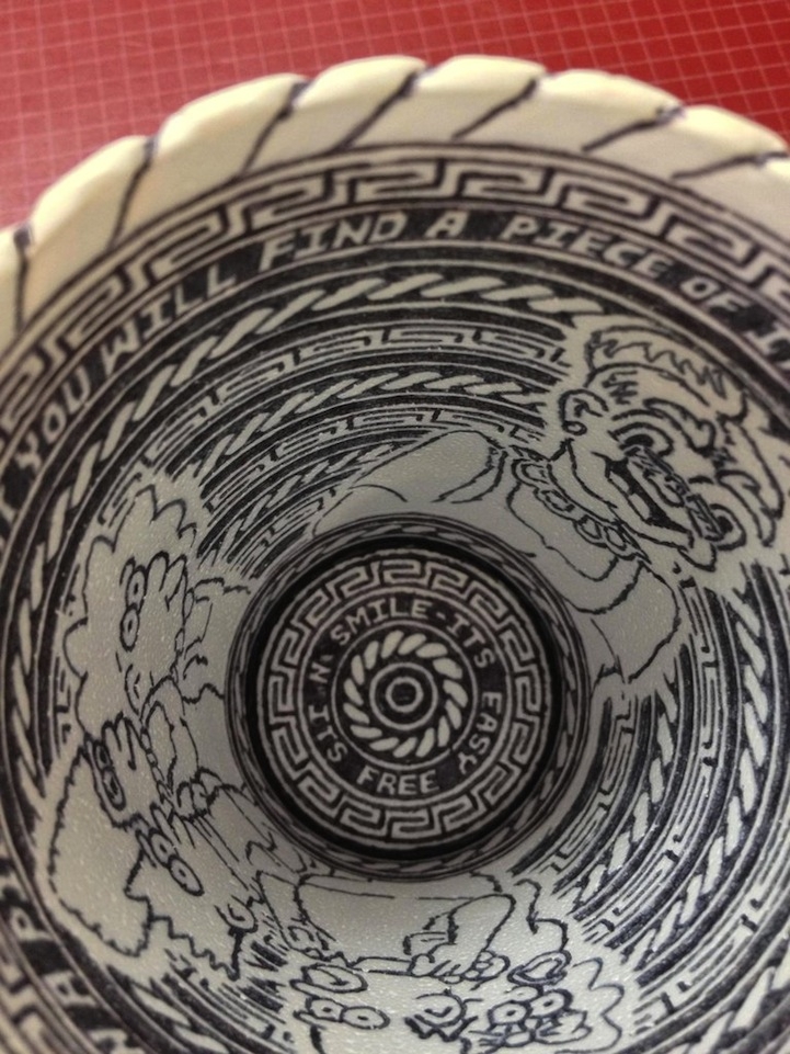 Incredibly detailed pen drawings on styrofoam cup 