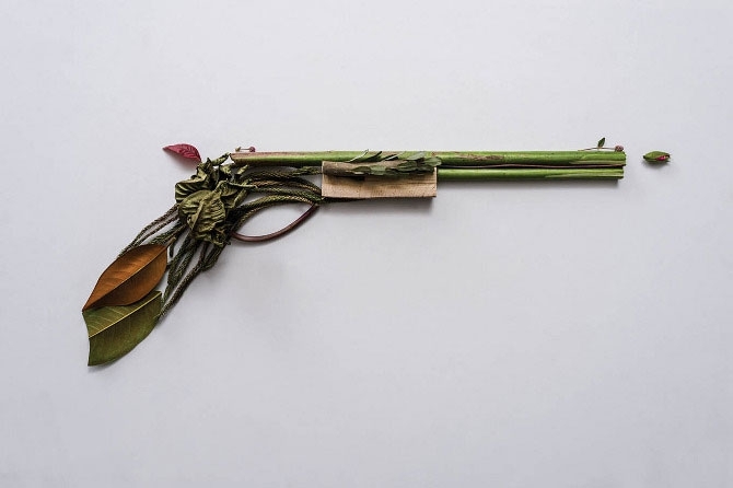 a gun made of plants