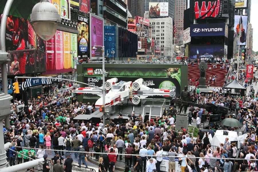 Thousands gather in New York City's Times Square to watch the unveiling of the world's largest LEGO Model