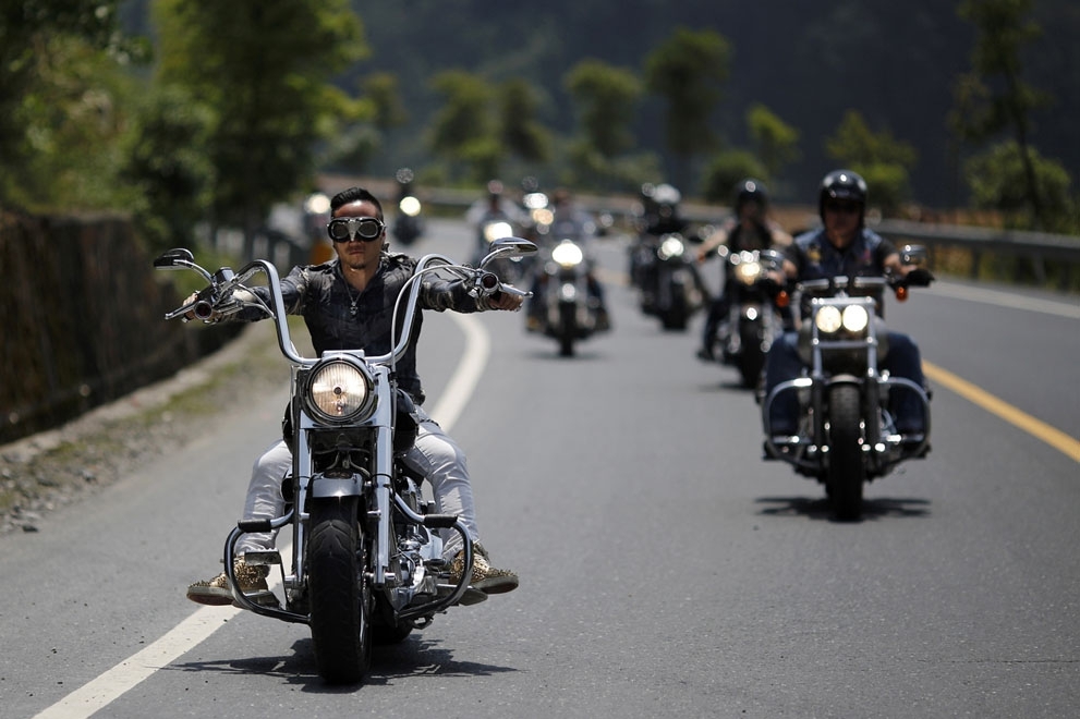 A man rides during the annual Harley Davidson National Rally in Qian Dao Lake, in Zhejiang Province, China, on May 11, 2