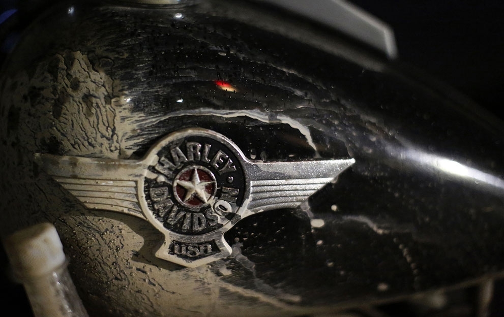 Harley Davidson logo on a dirtied motorcycle, during China's annual Harley Davidson Rally in Zhejiang Province, on May 1