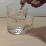 Dip a spoon of gallium in a glass of hot water