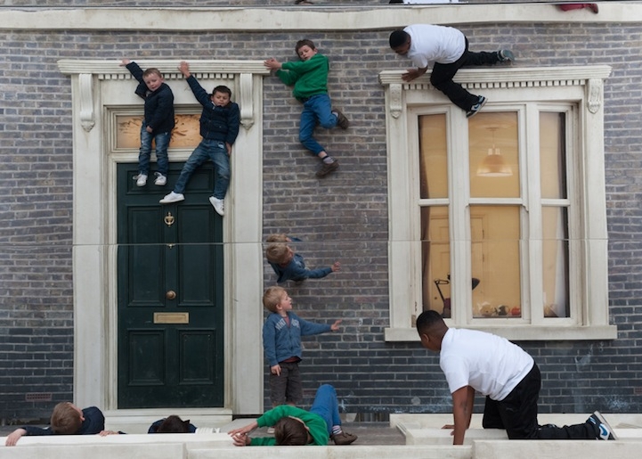 New Mind-Bending Illusion of People Scaling a Building 