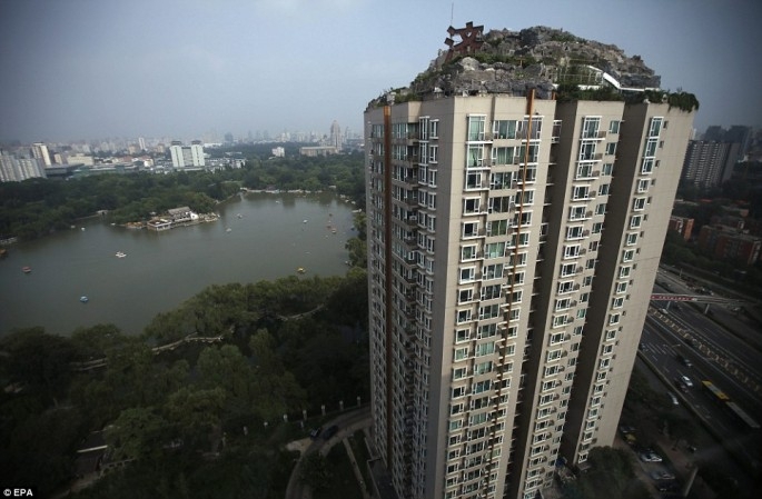 An Illegal Mountain Retreat On A 26 Story Apartment Block Built By A Beijing Professor. 