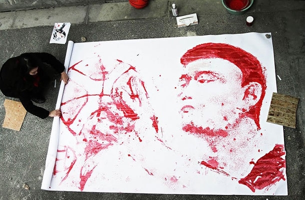 Impressive Portrait Of Yao Ming Painted Using A Basketball