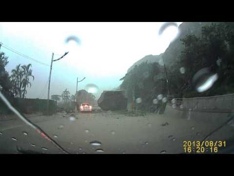 A Car Nearly Crushed by a Huge Boulder in a Landslide in Taiwan 