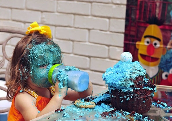 Little Girl Goes HAM On Cookie Monster Cake