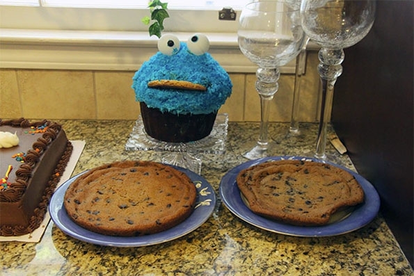 Little Girl Goes HAM On Cookie Monster Cake