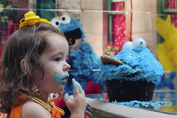 Little Girl Goes HAM On Cookie Monster Cake