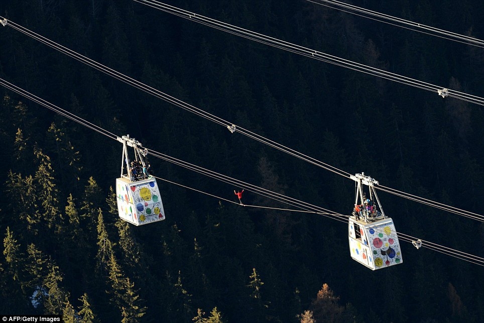 A daredevil highliner has performed a walk 1,200ft above the Alps. 