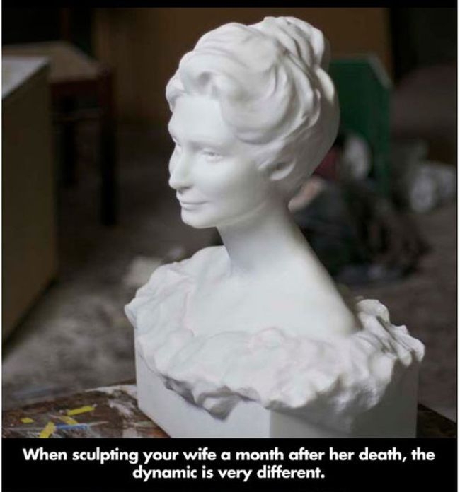 A marble sculpture of the dead wife and her dog