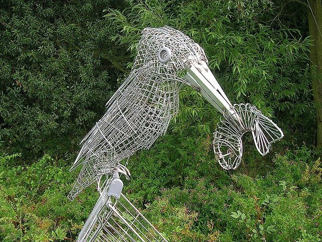 What This Guy Does With Hubcaps And Other Junk By The Road Is BRILLIAN