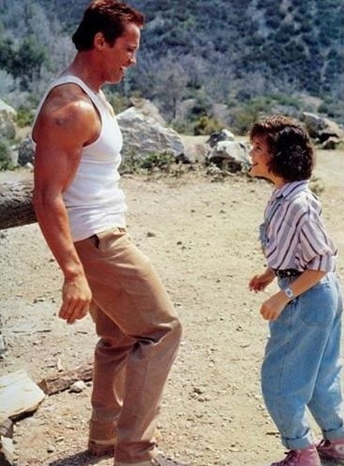 Arnold Schwarzenegger and Alyssa Milano Then & Now Read more at http:/
