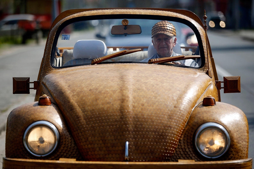 See That Guy In The Volkswagen Beetle? Well, Wait Til You Look Closer 