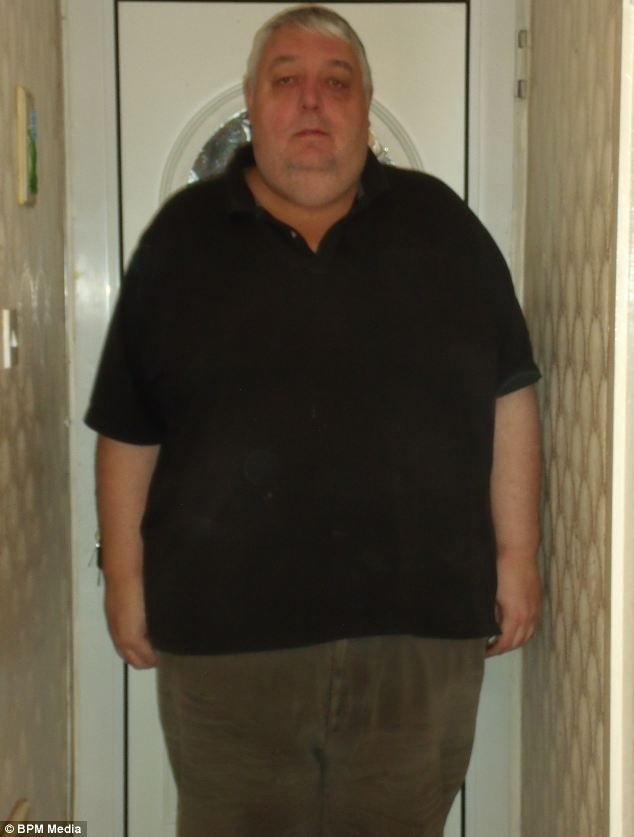 Teased husband sheds more than half his body weight through walking an