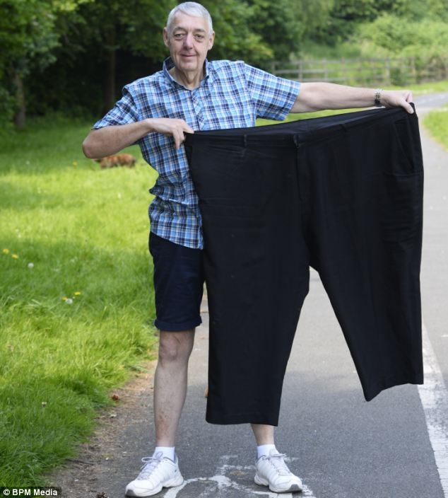 Teased husband sheds more than half his body weight through walking an