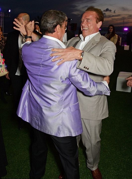 Schwarzenegger And Stallone Share A Dance