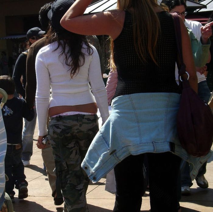 Ladies Hanging Right Out Of Their Clothes