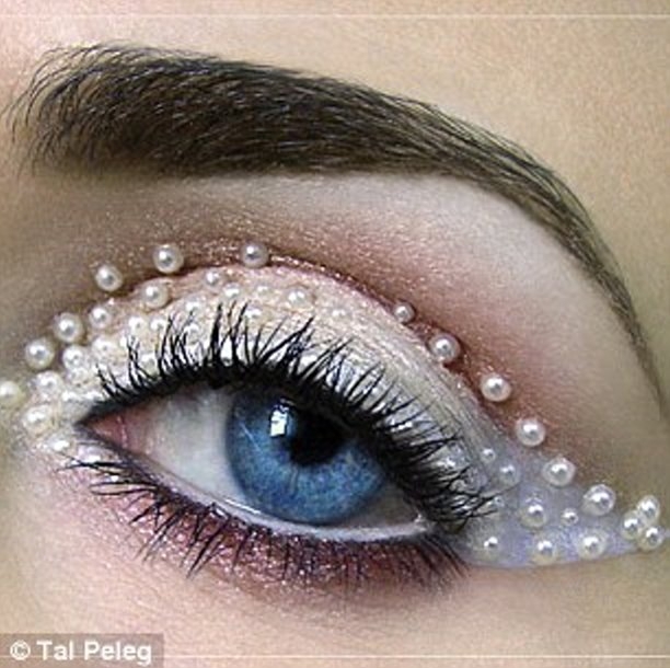 Tal Peleg creates the designs using liquid eyeliner and eyeshadow  