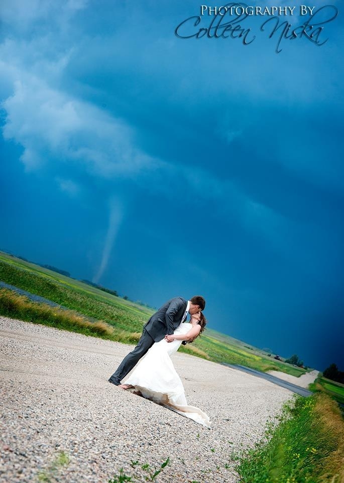 This Couple’s Wedding Pictures Were Photobombed By A Tornado
