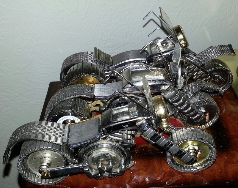 Guitars, Motorcycles, And Insects Are Made With Old Watch Parts
